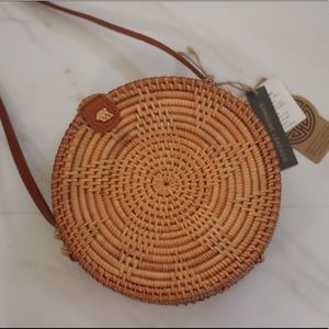 Handcrafted straw purse/genuine leather strap.